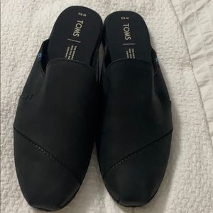 Toms black leather loafers